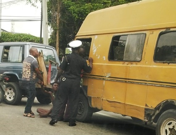 NIGERIA: Bus Driver Strips Naked & Gets Under His Bus (PHOTOS)
